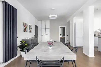 a dining room with a table and chairs at Luxury villa Taravilla with pool in Altavilla Milicia