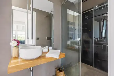 a bathroom with a sink and a shower at Luxury villa Taravilla with pool in Altavilla Milicia
