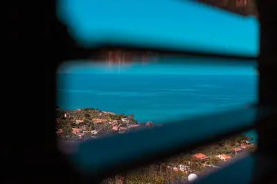 a view of a small island in the water at Villa Le Terrazze in Cefalù