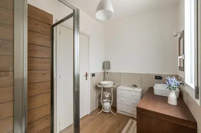 a bathroom with a sink and a mirror at Villa Giovanna con Piscina by Wonderful Italy in Castellammare del Golfo
