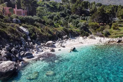 an aerial view of a beach with people on it at Villa Acquamarina - 300 meters from the sea in Scopello