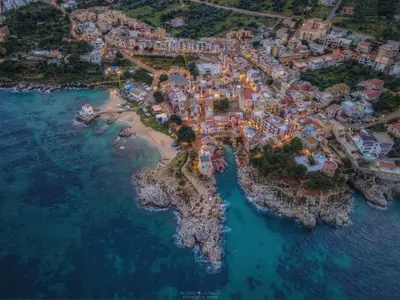 an aerial view of a small island in the ocean at Bellavista in Santa Flavia