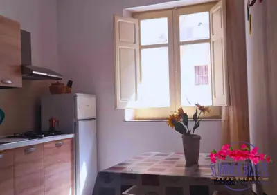a screenshot of a cell phone with the text upgraded to summer breeze apartments at Summer Breeze Apartments in Trappeto