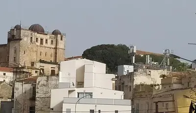 a group of buildings on top of a city at Star Apartment at the Cathedral in Palermo