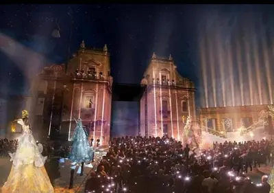 a large group of people standing in front of a building at La casetta di gra in Palermo