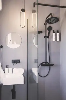 a bathroom with a shower and a sink at Villa delle Sterlizie con piscina e jacuzzi by Le Dhome Sicily in Partinico