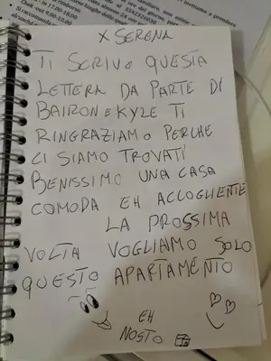 a notebook with handwriting on it on a table at Ciuridda mia in Palermo