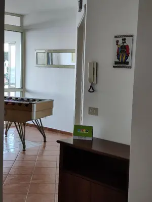 a room with a ping pong table and a pool table at Luna Marina - Sicilian beach house in Santa Flavia