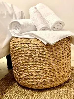 a bedroom with a large white bed with two lamps at Oltremare Suite N37 Benessere invernale con vista mare in Bagheria