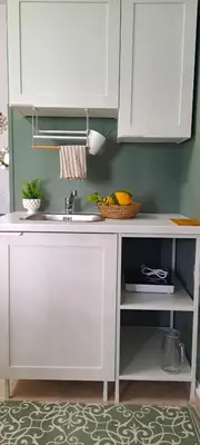 a kitchen counter with a sink and a bowl of fruit at Casa di Nat in Palermo