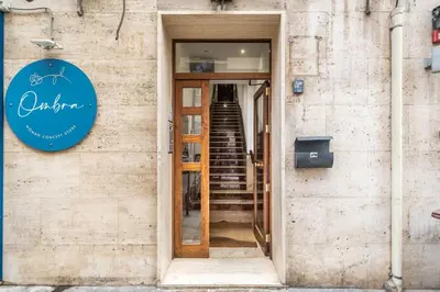 an open door to a building with a staircase at [MoroHouse] 50mt from Teatro Massimo in Palermo