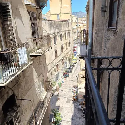 an overhead view of an alley between two buildings at [CENTRO STORICO] Casa Bellini ***** in Palermo