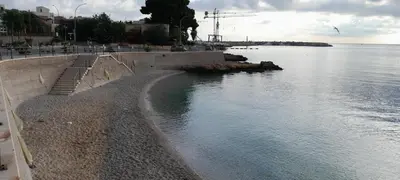 a view of a body of water with a beach at Casa Vacanze Altea in Santa Flavia