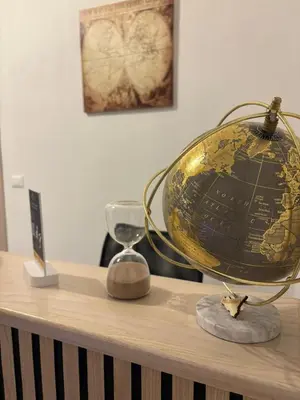 a globe sitting on top of a wooden table at Luna Marie in Palermo