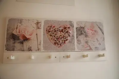 two open books with a heart on the pages at La Maison Du Centre in Palermo