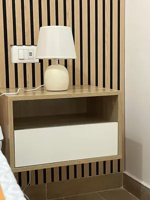 a lamp on a shelf in a bedroom at Villa Vittoria in Trappeto