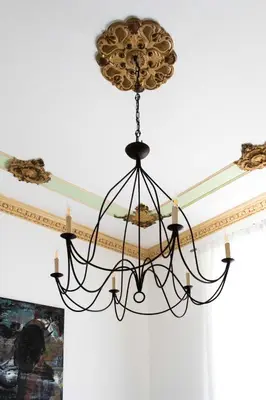 a chandelier hanging from a ceiling at Libertà 78 - Art Suite & Spa in Palermo