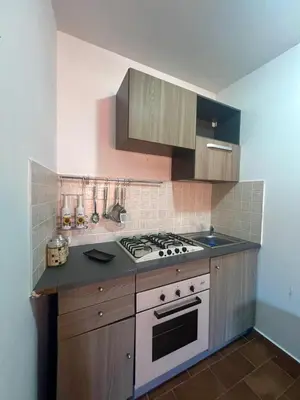 a kitchen with a stove and a counter top at Casa giambona in Capaci
