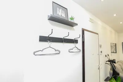 a pair of hooks hanging on a wall at Modern House Orleans in Palermo