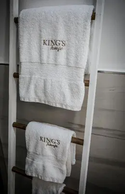 two towels on a towel rack in a bathroom at King's house apartments in Palermo