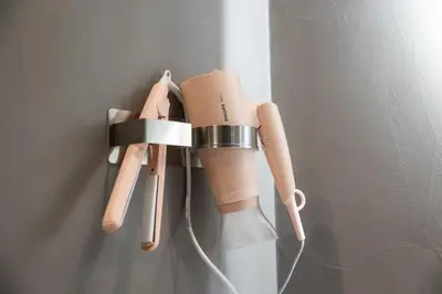 a robot is hanging on a wall at Platinum Suite&Spa in Palermo