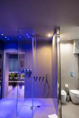 a bathroom with a glass shower and a toilet at Platinum Suite&Spa in Palermo