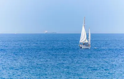 a sail boat in the middle of the ocean at Beautiful Home In Cinisi With Wifi in Cinisi