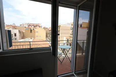 a view from the window of a balcony at Studio Florio in Palermo