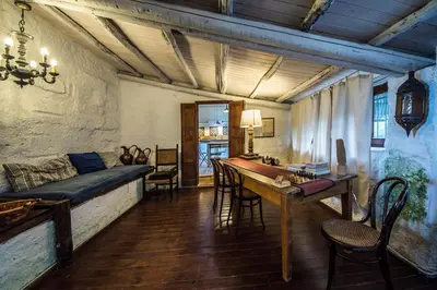 a living room with a couch and a table at Casa Strelizie in Terrasini