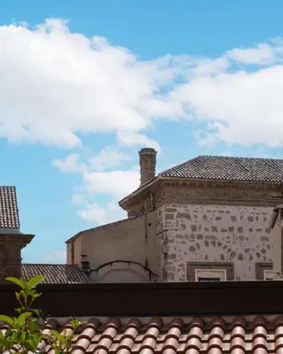 an old building with chimneys on top of a roof at Casa Design tra le Mura by Wonderful Italy in Palermo