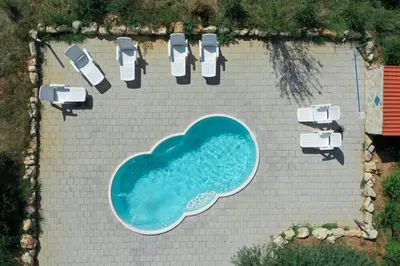 an overhead view of a parking lot with cars and a swimming pool at GuestHost - La Giara - Villa with Swimming Pool and Parking in Castellammare del Golfo