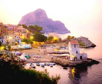 a harbor with a bunch of boats in the water at Donna Carmela in Porticello