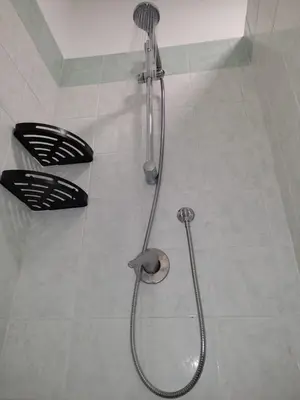a shower with a shower head in a bathroom at A CASA DI GRACE in Palermo