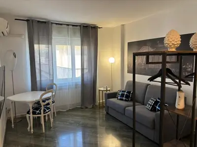 a living room with a couch and a table at A CASA DI GRACE in Palermo