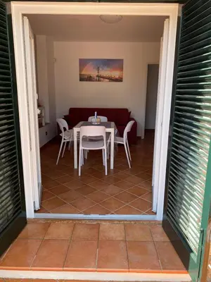 a dining room with a table and chairs at PANORAMIC VIEW - Sabrina's house in Altavilla Milicia