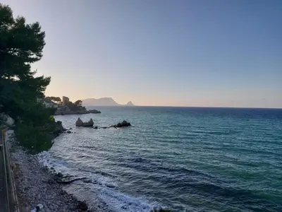 a view of the ocean with a rocky shoreline at PANORAMIC VIEW - Sabrina's house in Altavilla Milicia