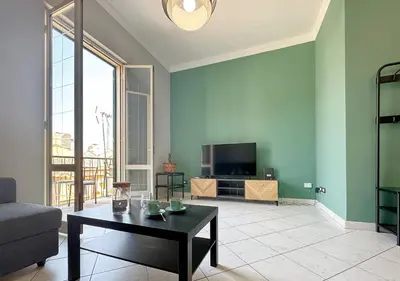 a living room with a couch and a coffee table at Solemar Sicilia - Casa Scordia in Palermo