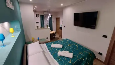 a room with a bed with two towels on it at Sogni d'oro in Partinico