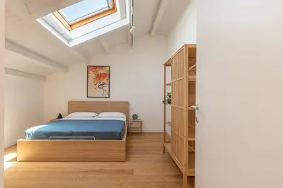 a bathroom with a sink and a toilet and a mirror at Oretea Apartment with Terrace by Wonderful Italy in Palermo