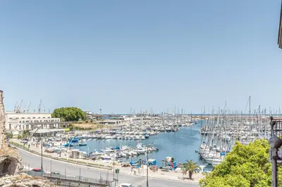 a harbor filled with lots of boats in the water at Oretea Apartment with Terrace by Wonderful Italy in Palermo