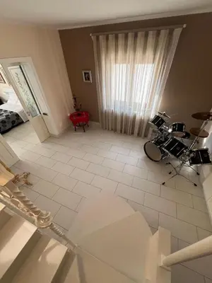a view of a living room with a window at Casa delle Stelle in Mondello