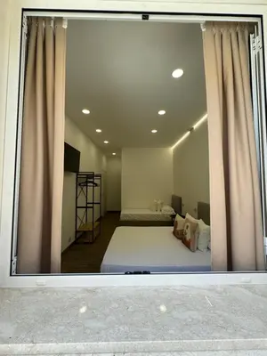 a bedroom with a bed and a large window at Casa Bedda - INTERA CASA CON 3 CAMERE CON BAGNO PRIVATO, ARIA CONDIZIONATA E NO ZTL/ENTIRE APARTMENT WITH 3 BEDROOMS WITH PRIVATE BATHROOM, AIRCON AND NO LTZ in Castellammare del Golfo
