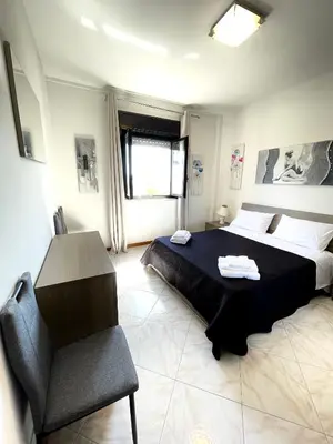 a living room with a couch and a table at Casa vacanza ''I Mori di Carmen'' - Appartamento Eterno Amore in Palermo