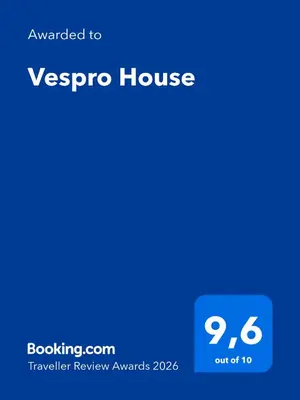 a screenshot of the veypro house homepage with the text upgraded to versop at Vespro House in Palermo