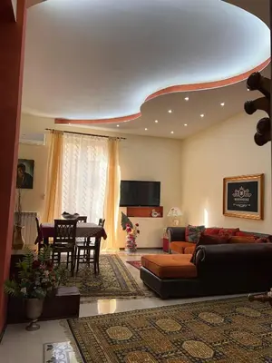 a living room with a couch and a table at Ninohouse in Palermo