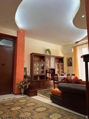 a living room with a couch and a table at Ninohouse in Palermo