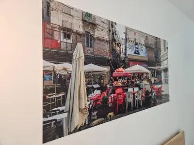 a picture of a city with an umbrella on a wall at Porta D ossuna comfort apartments in Palermo