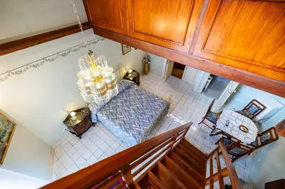 an overhead view of a living room with a chandelier at Francy House in Termini Imerese