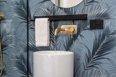 a bathroom with a toilet and a towel dispenser at Venere - Alle Spalle del Teatro Massimo in Palermo