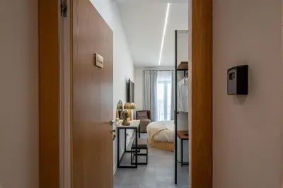 a hallway with a door leading to a bedroom at Venere - Alle Spalle del Teatro Massimo in Palermo